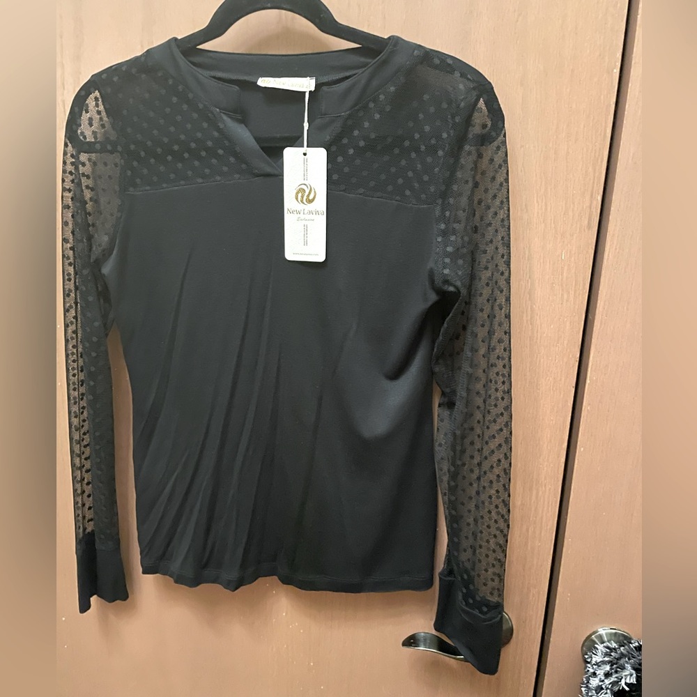 Black pullover blouse with polka dotted shoulder and arms. Size 42 or Medium